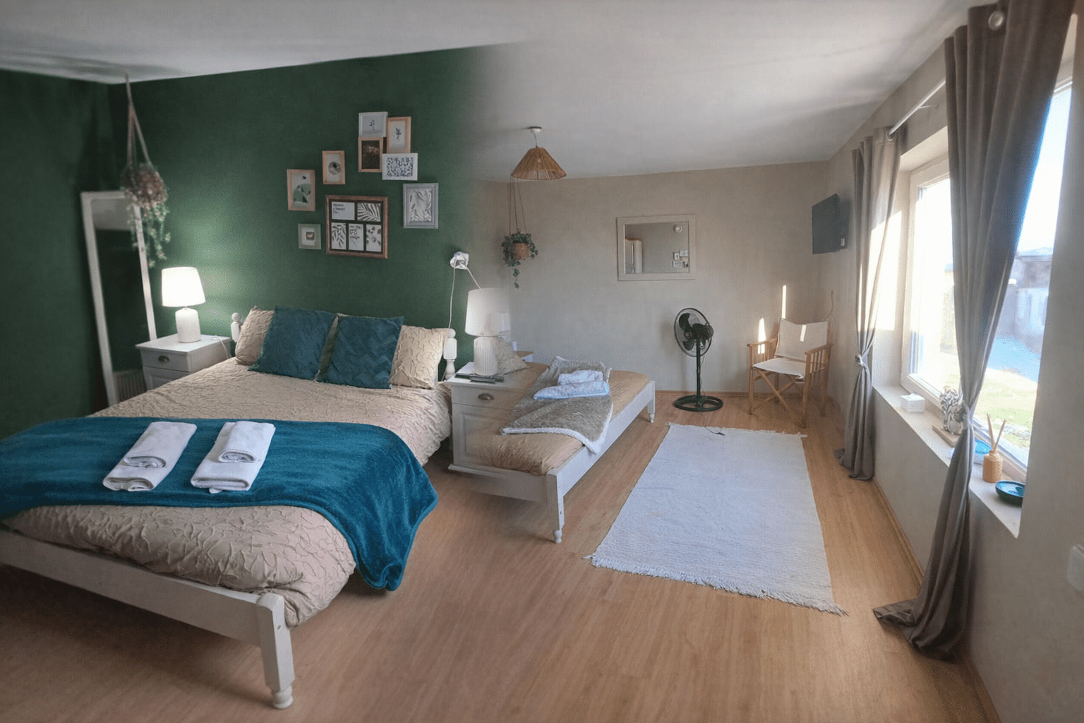 A spacious, well-lit bedroom in a Kovachevets guest house features a double bed with teal and beige bedding, a single bed, a gallery wall, bedside tables with lamps, a fan, desk, large window with curtains, and light wood flooring.